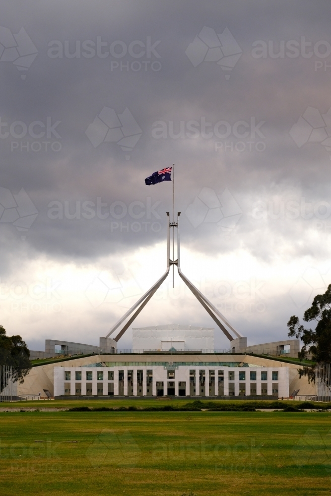 Storm clouds gathering over Parliament House, Canberra - Australian Stock Image