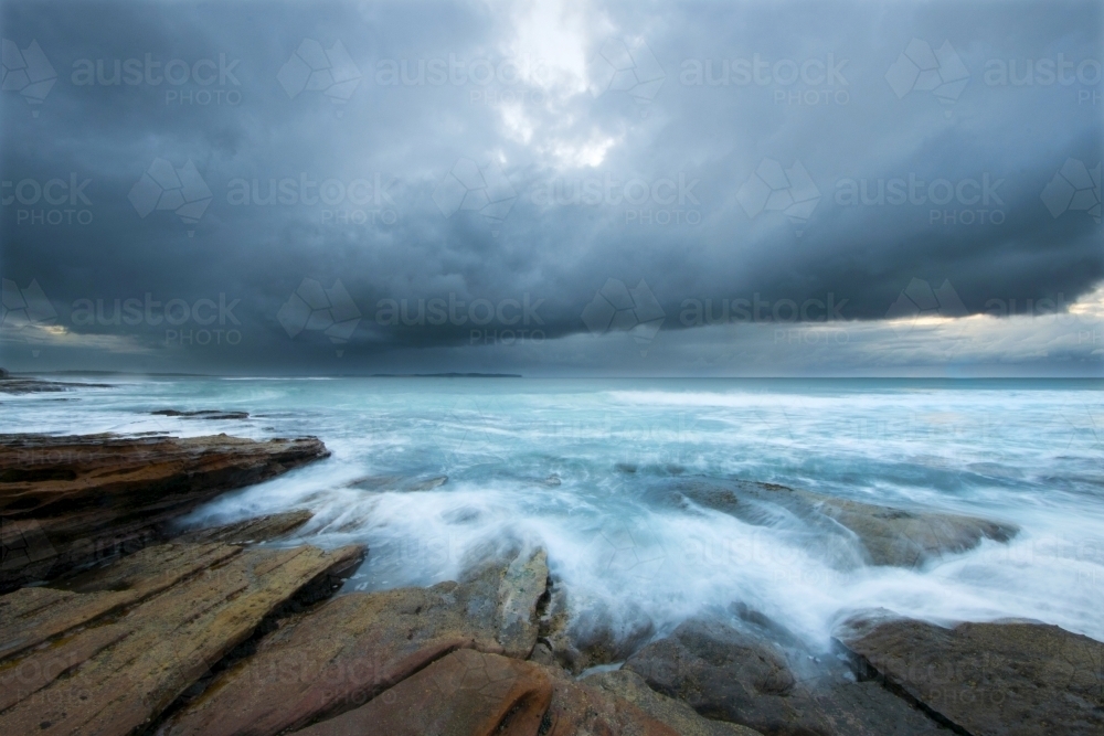 Storm clouds over coastline - Australian Stock Image