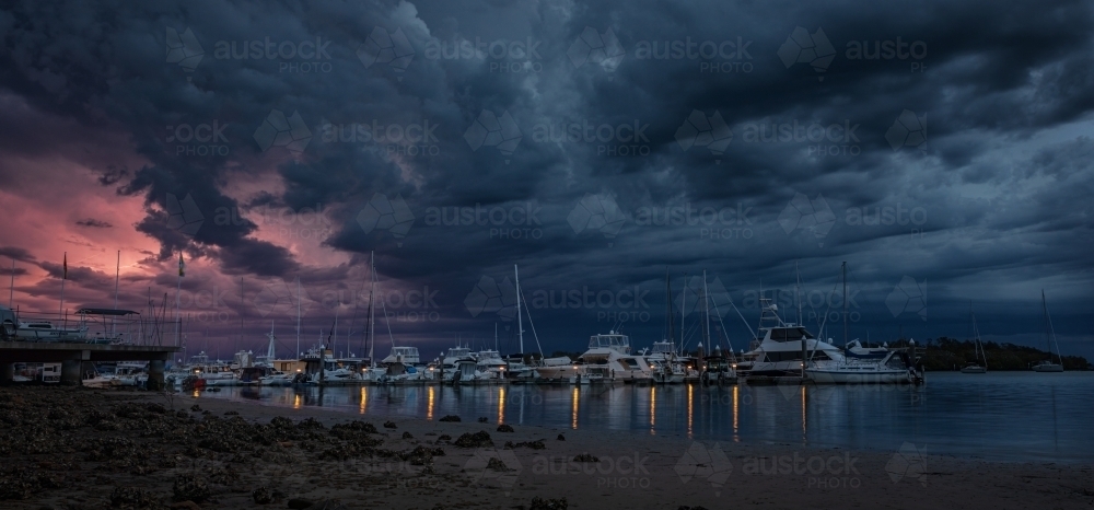 Storm clouds over Soldiers Point Marina, Port Stephens - Australian Stock Image