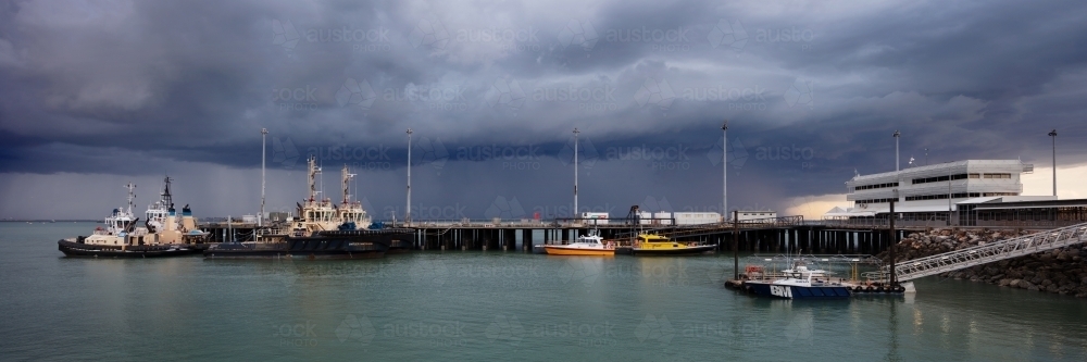 Storm clouds over Stokes HIll Wharf Darwin City - Australian Stock Image