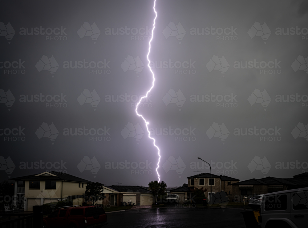storm in suburbs lightning strike down the centre - Australian Stock Image