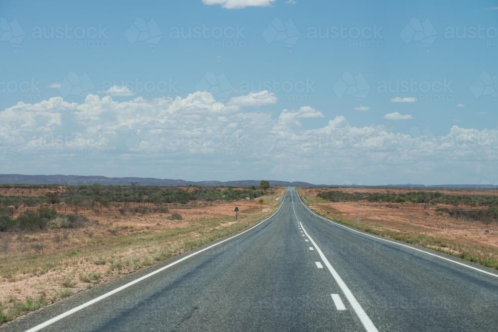 Straight highway disappearing into the distance - Australian Stock Image