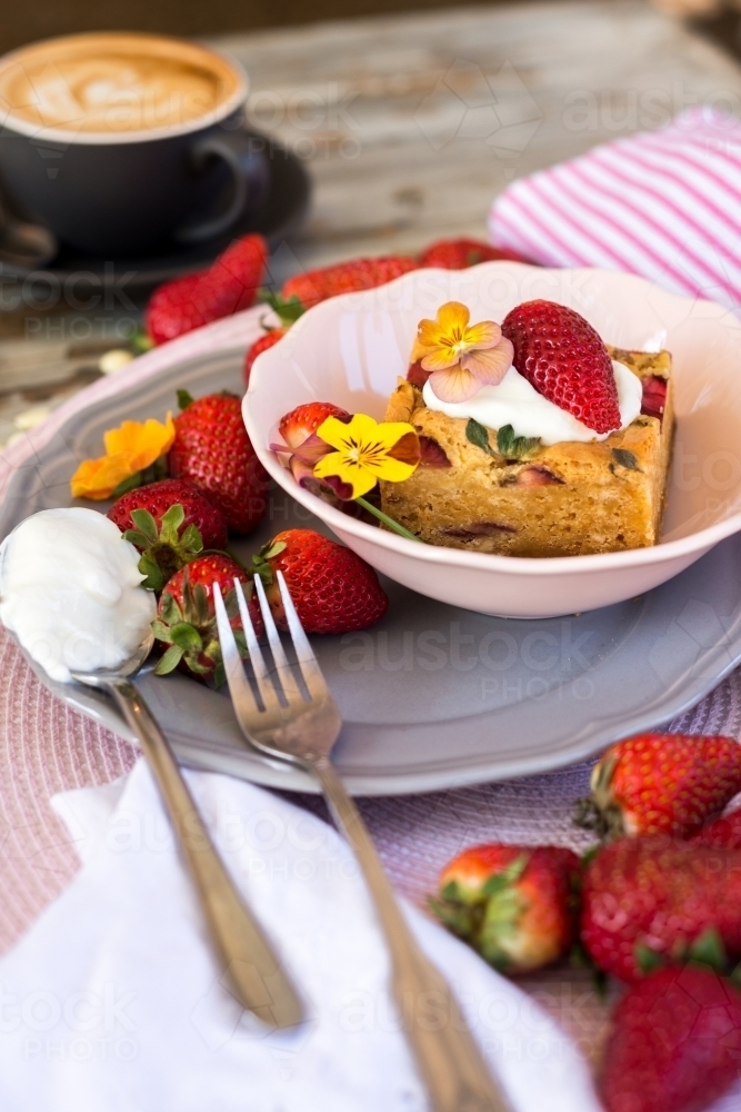 Strawberry white chocolate blondie in a pink bowl - Australian Stock Image