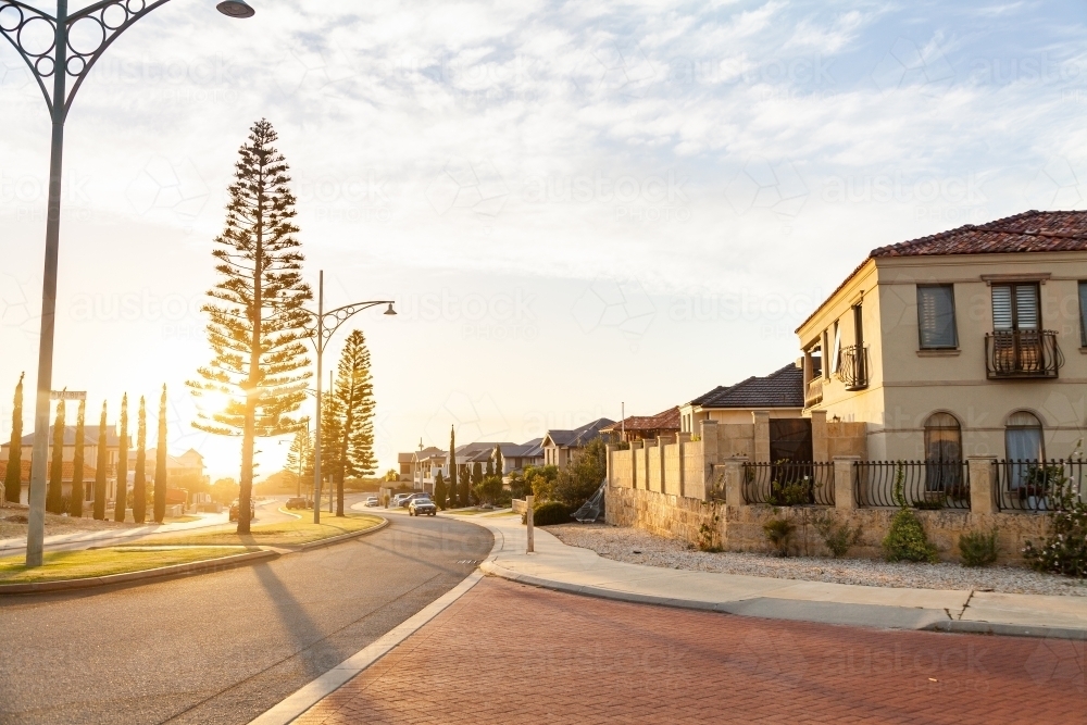 Image of Street scene of houses near the coast at sunset in Iluka Perth Austockphoto