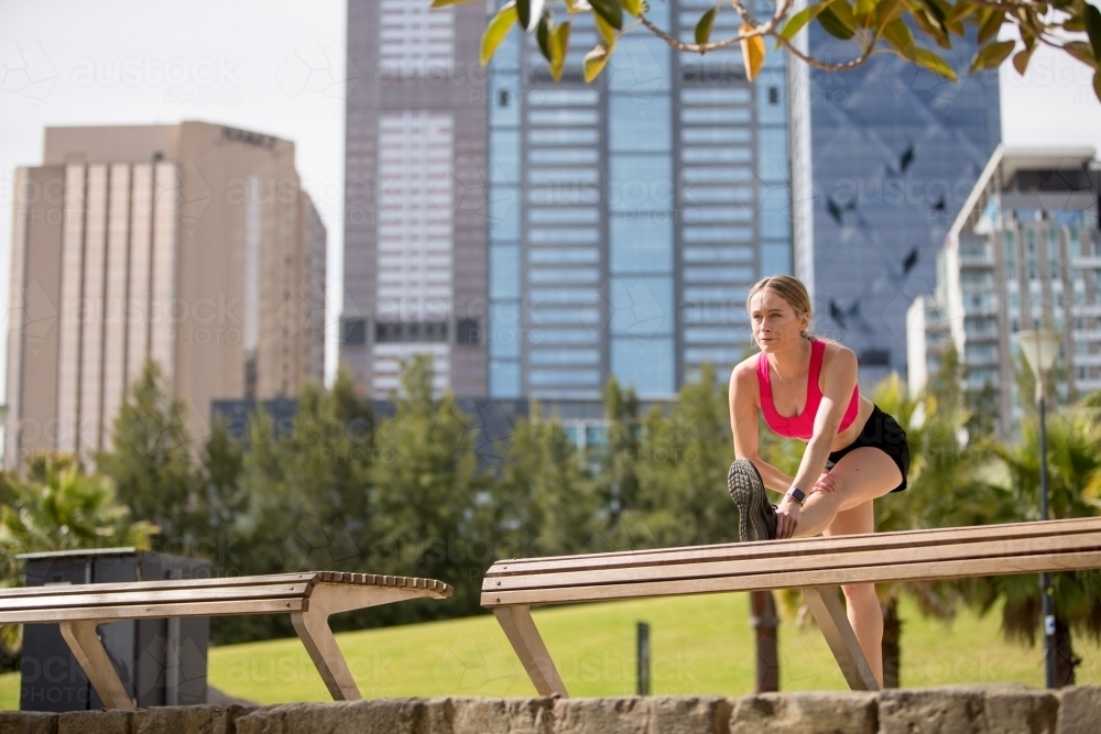 Stretching Before Going Jogging - Australian Stock Image