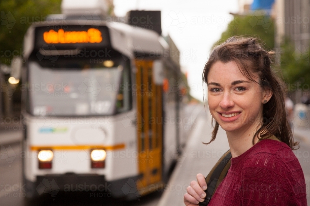 Student About to Catch the Tram - Australian Stock Image