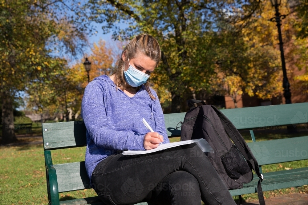 Student Studying in the Park - Australian Stock Image