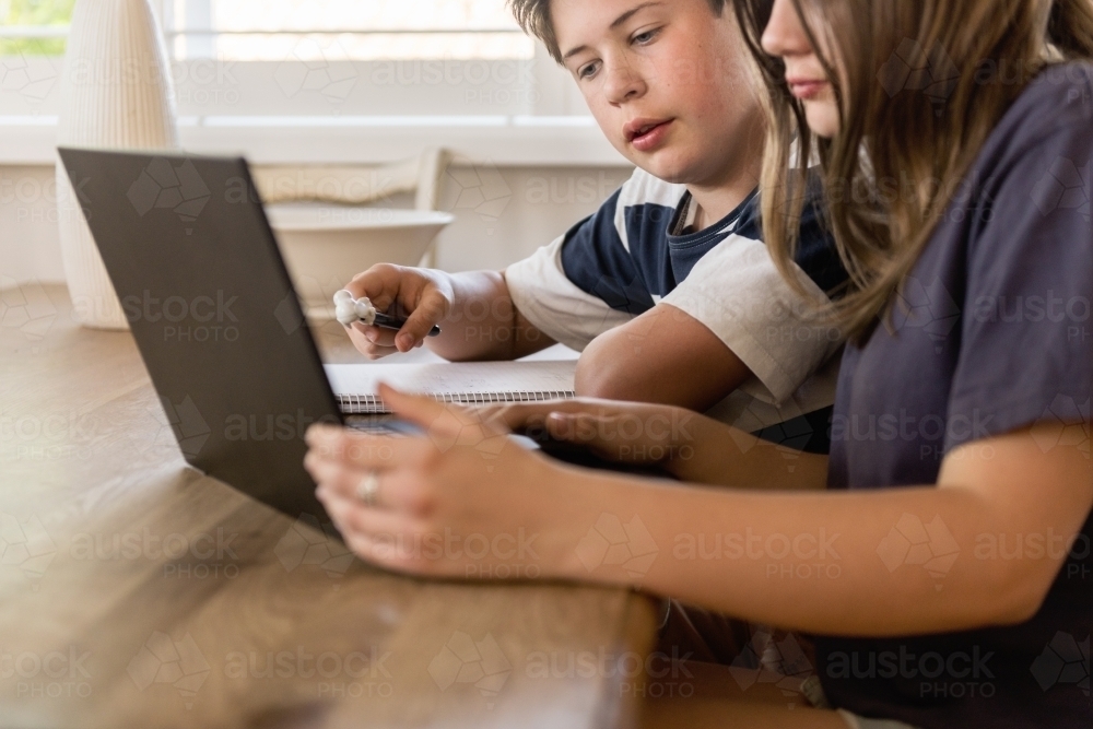 students using computer to do homework - Australian Stock Image