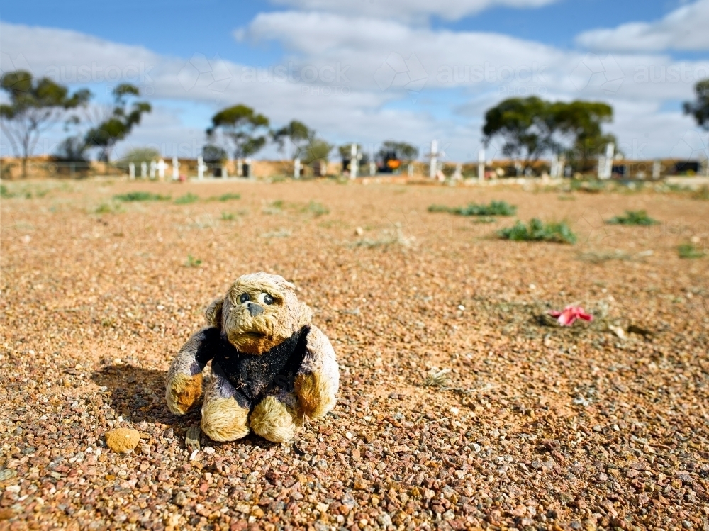 Stuffed toy at Coober Pedy cemetery - Australian Stock Image