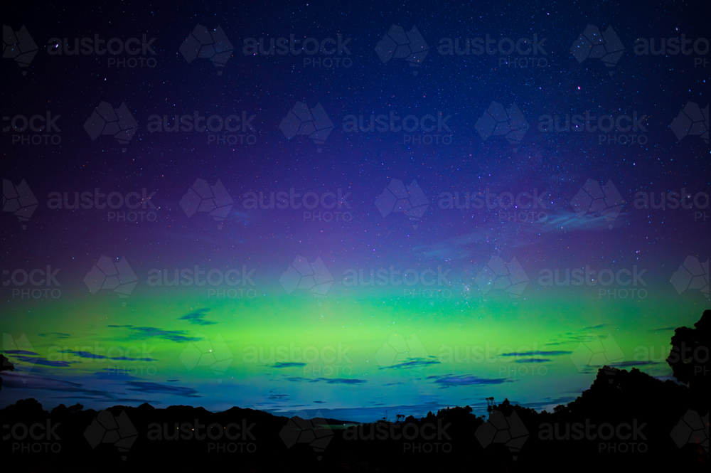 stunning aurora display with green and purple lights - Australian Stock Image