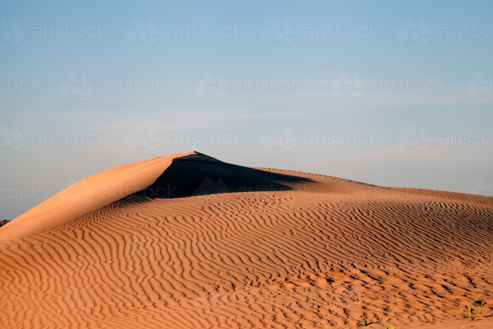 Stunning red patterned sand dunes - Australian Stock Image