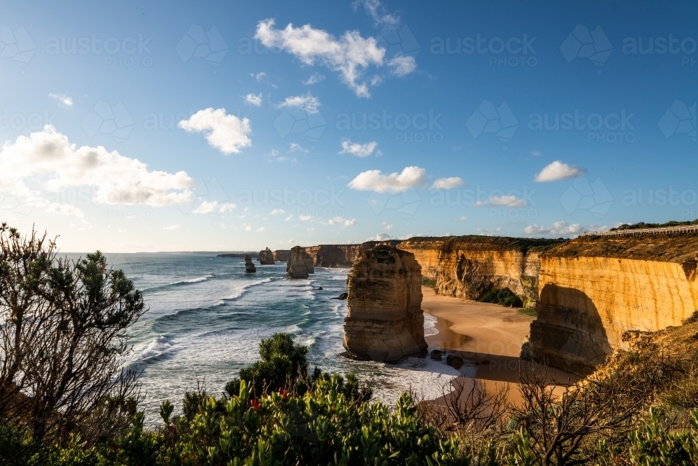 Stunning view of coastal monoliths known as The Twelve Apostles, in beautiful late afternoon light. - Australian Stock Image