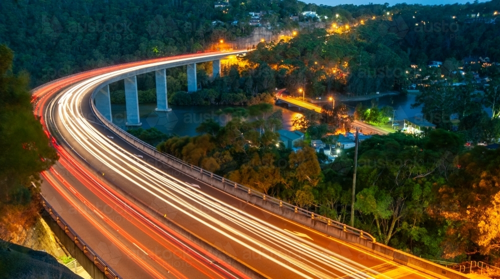 Stunning Woronora bridge with light trails of vehicles creating bright streaks - Australian Stock Image