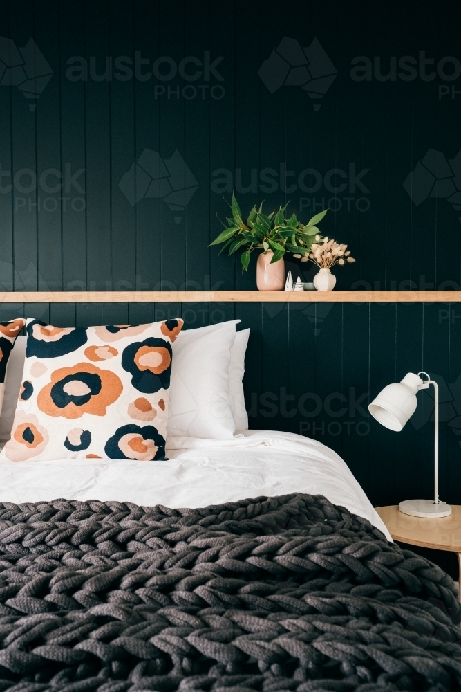 Stylish dark bedroom decor. - Australian Stock Image