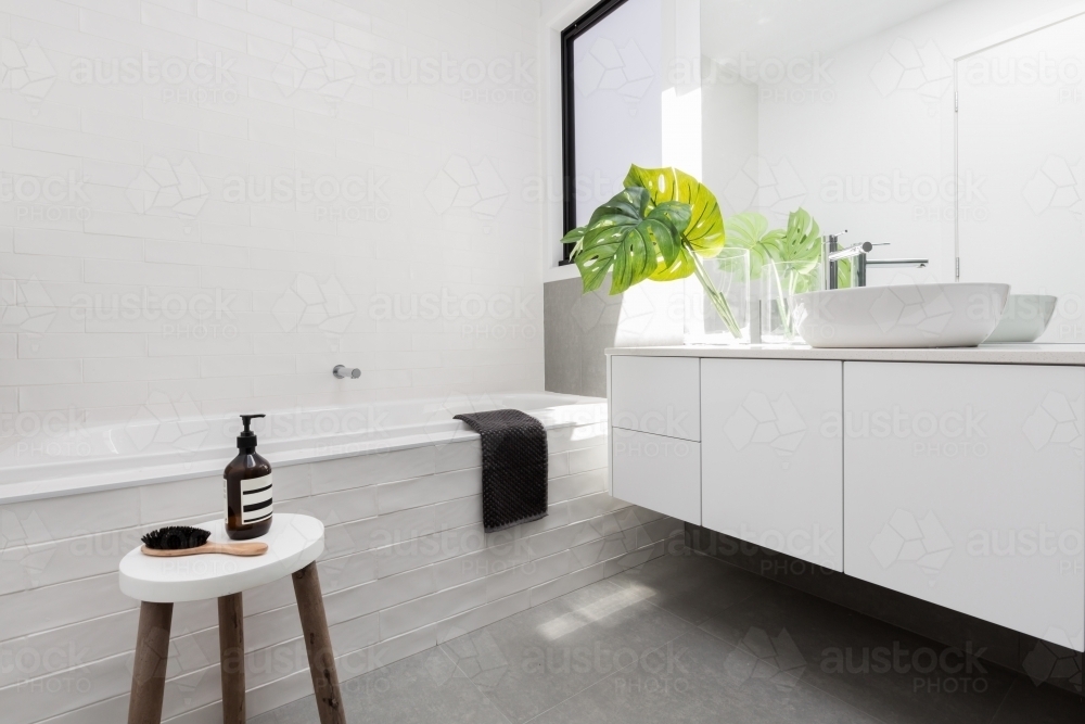 Stylish family bathroom of white scandinavian theme - Australian Stock Image