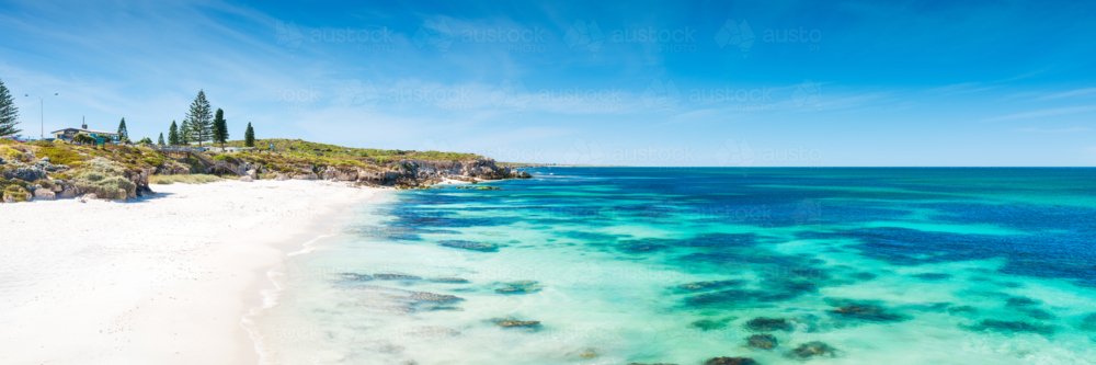 Summer skies and turquoise waters along burns beach western australia - Australian Stock Image