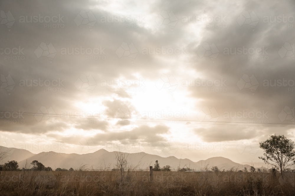 Sun Rays Side View Image of sun rays shining over a remote central Queensland landscape ...