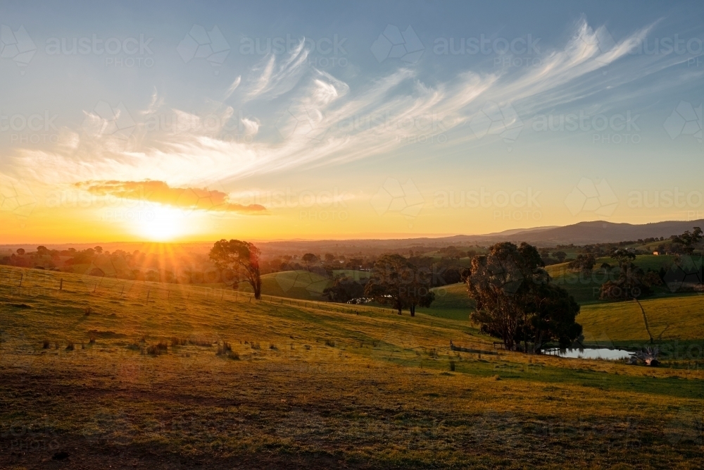 Sun setting over Strathewen - Australian Stock Image