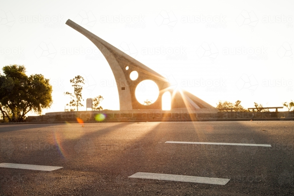 Sun star shining through largest sundial in australia - Australian Stock Image