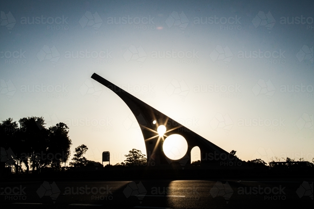 Sun star shining through largest sundial in australia - Australian Stock Image