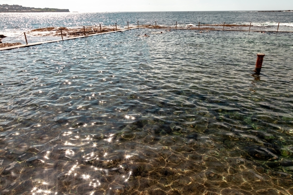Sunlight reflected on an ocean pool - Australian Stock Image