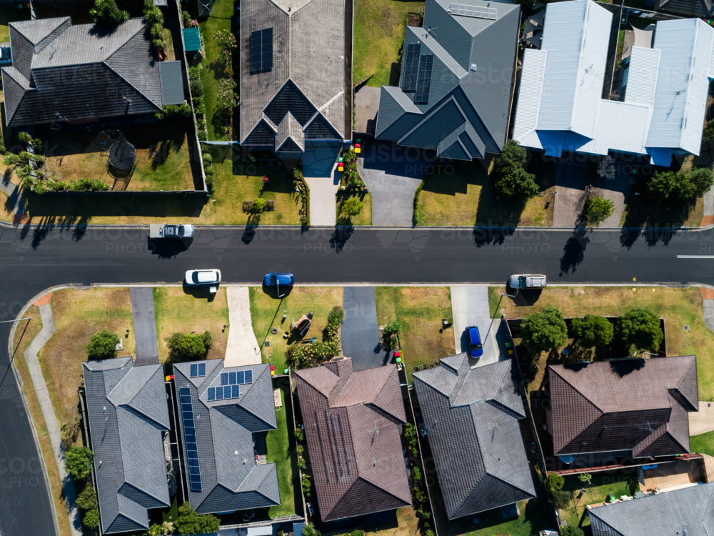 Sunlit aerial view over houses in Aberglasslyn a Maitland suburb in Hunter Valley - Australian Stock Image