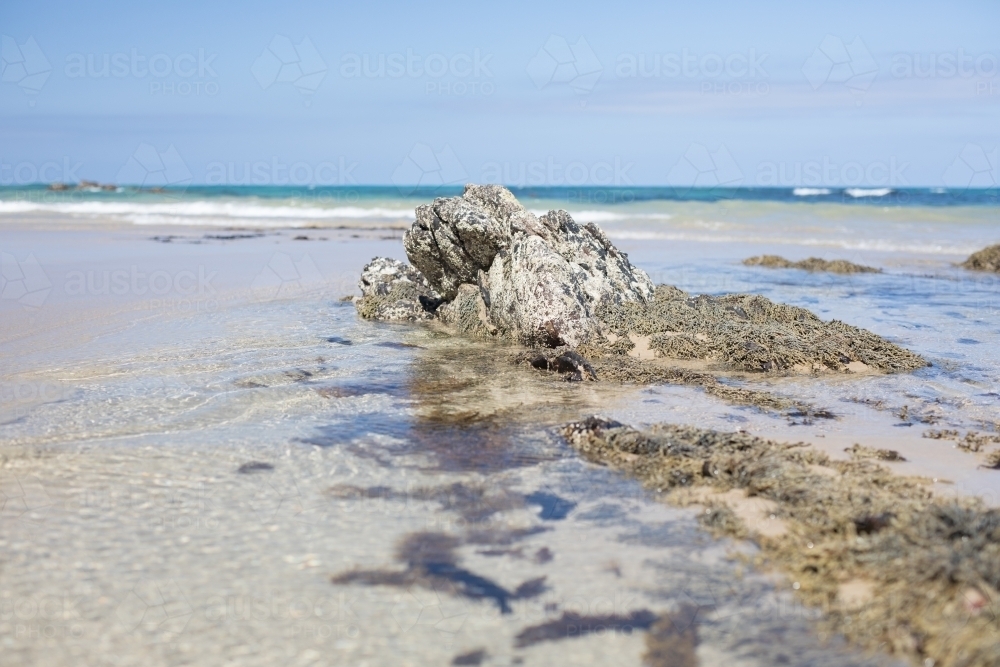 Sunlit Beach Rock - Australian Stock Image