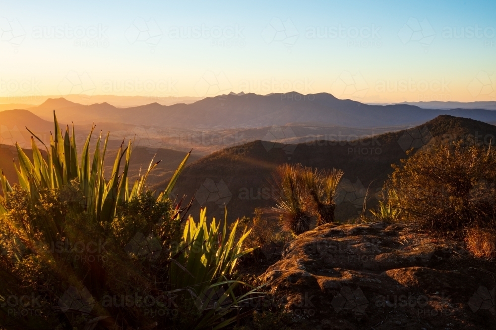Sunrise across mountains in the Scenic Rim - Australian Stock Image