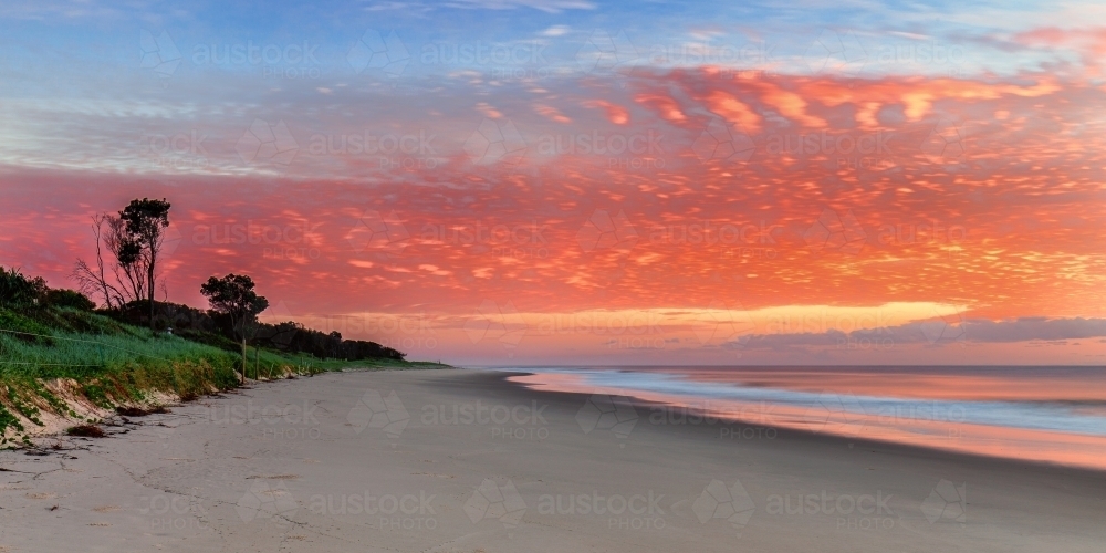 Sunrise over a desolate beach - Australian Stock Image