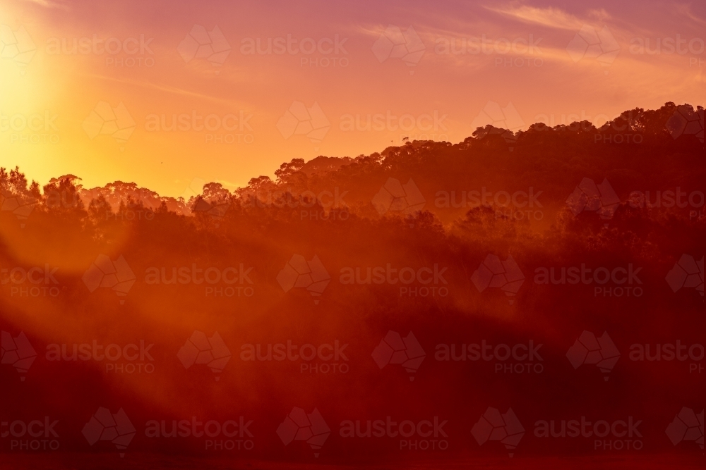 Sunrise over a mountain range - Australian Stock Image