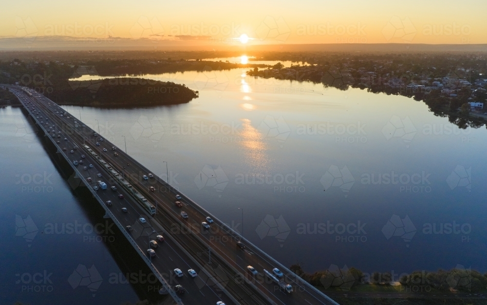 Sunrise over Perth's Canning River and Mt Henry bridge - Australian Stock Image