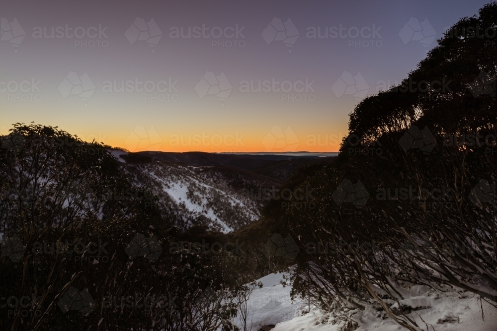 sunrise over snowy mountains, Mt Hotham region - Australian Stock Image