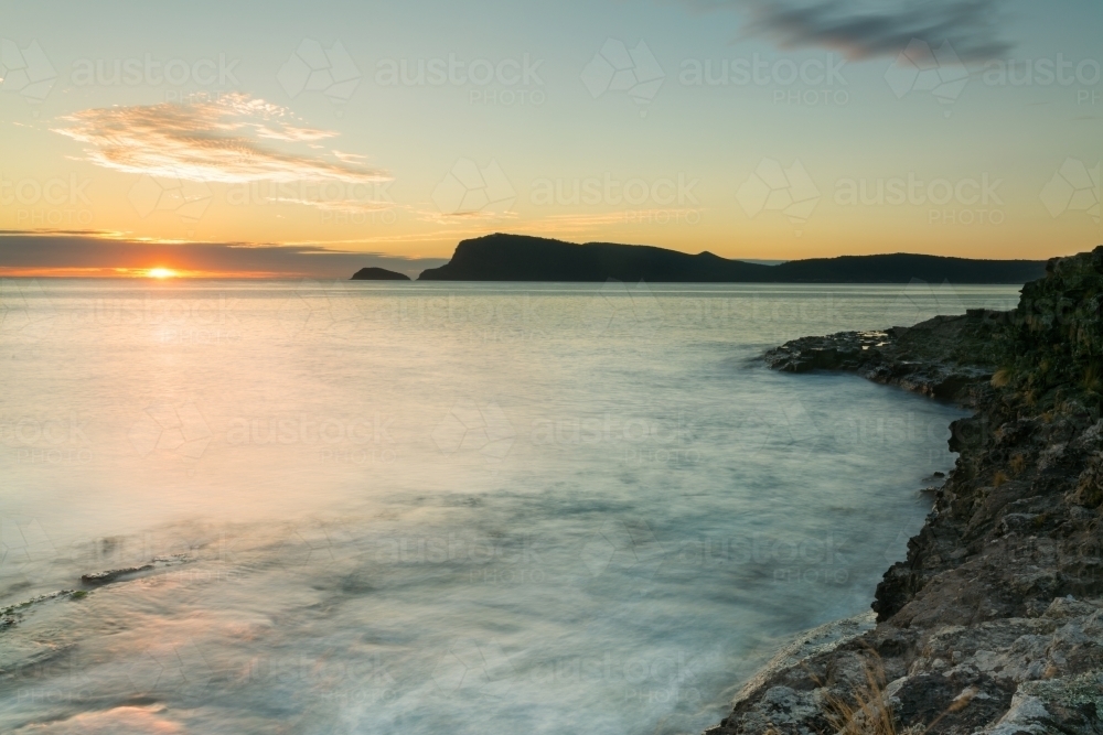 sunrise over the ocean, blurred water - Australian Stock Image