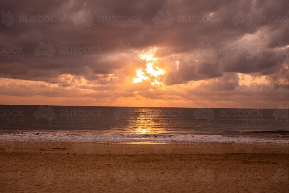 Image of Sunrise over the Pacific Ocean - Austockphoto
