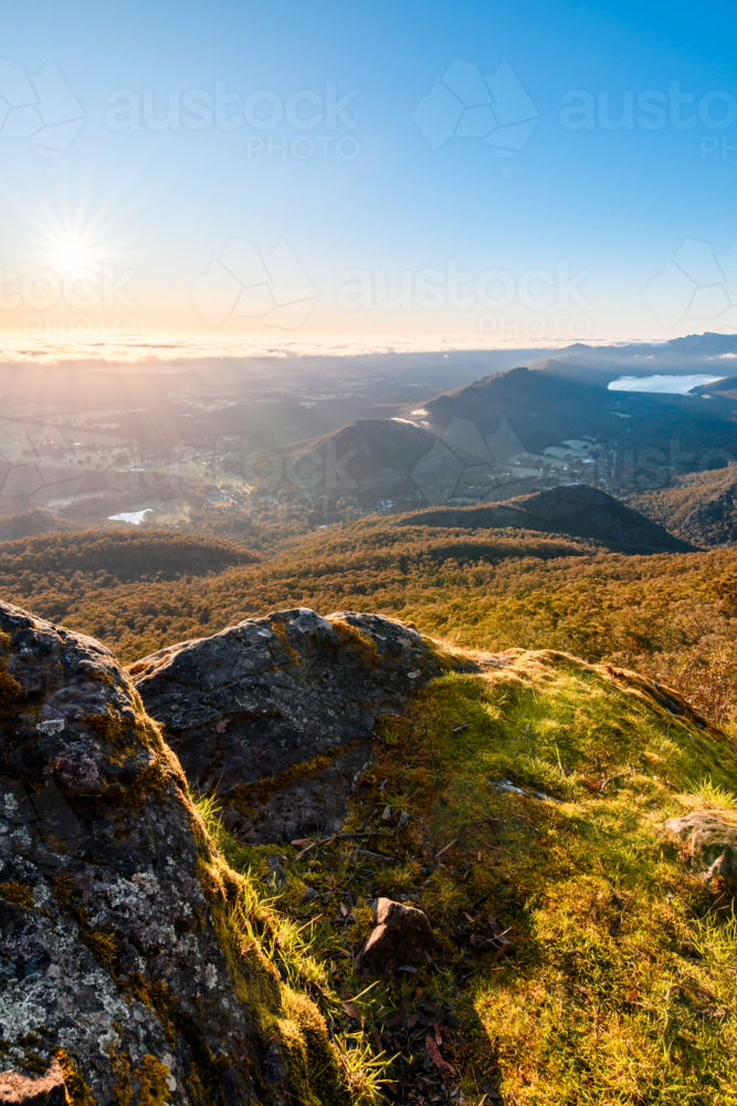 Sunrise viewed from Boroka Lookout towards Halls Gap, Grampians mountain range, Victoria, Australia - Australian Stock Image