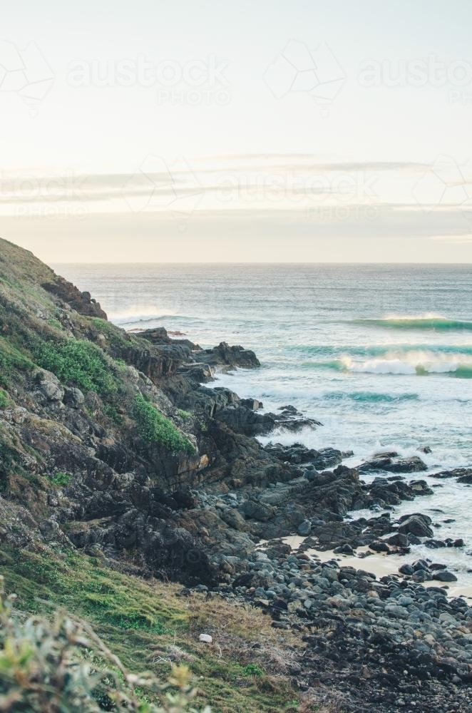 Sunrising over ocean and cliffs - Australian Stock Image