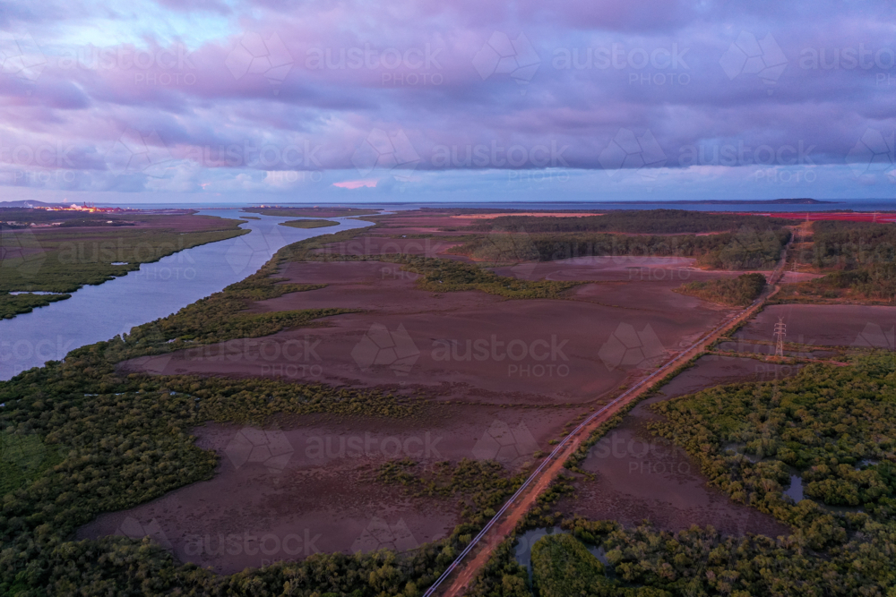 Sunset aerial view of coastal wetland estuary - Australian Stock Image