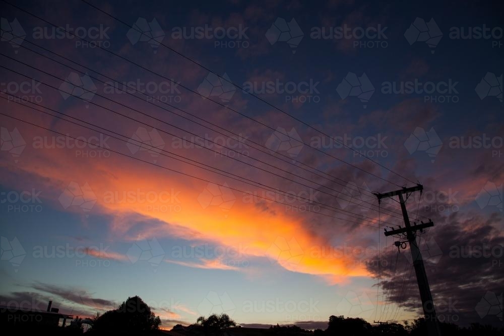 Sunset and power lines - Australian Stock Image