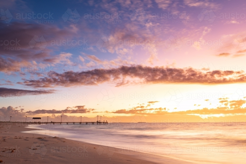 Sunset at Jurien Bay with jetty in background - Australian Stock Image