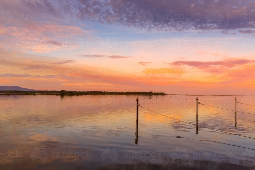 Sunset colours on the Mallacoota Inlet Victoria - Australian Stock Image