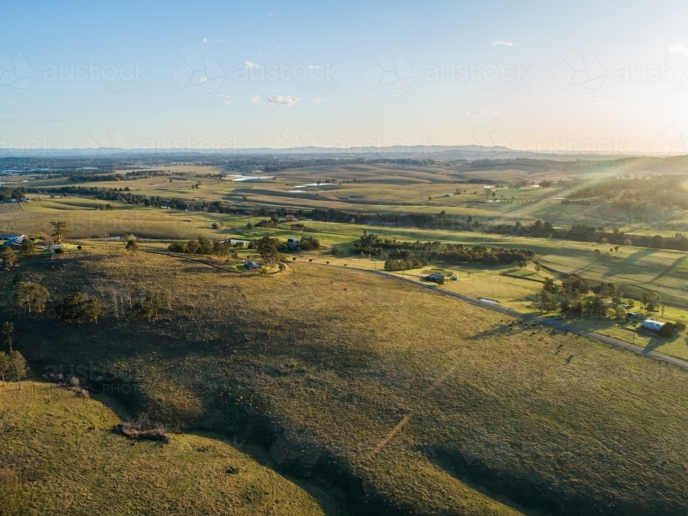 Image of Sunset drone photo of Australian landscape with farm houses ...