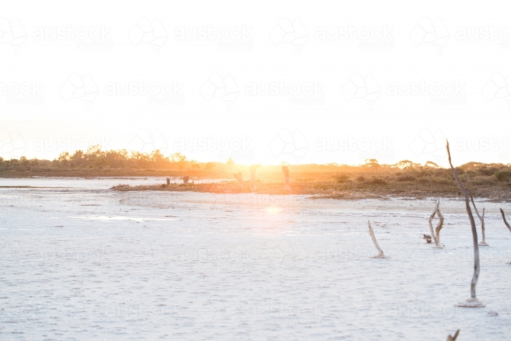 Sunset glow over the pristine waters of Kakadu National Park. - Australian Stock Image