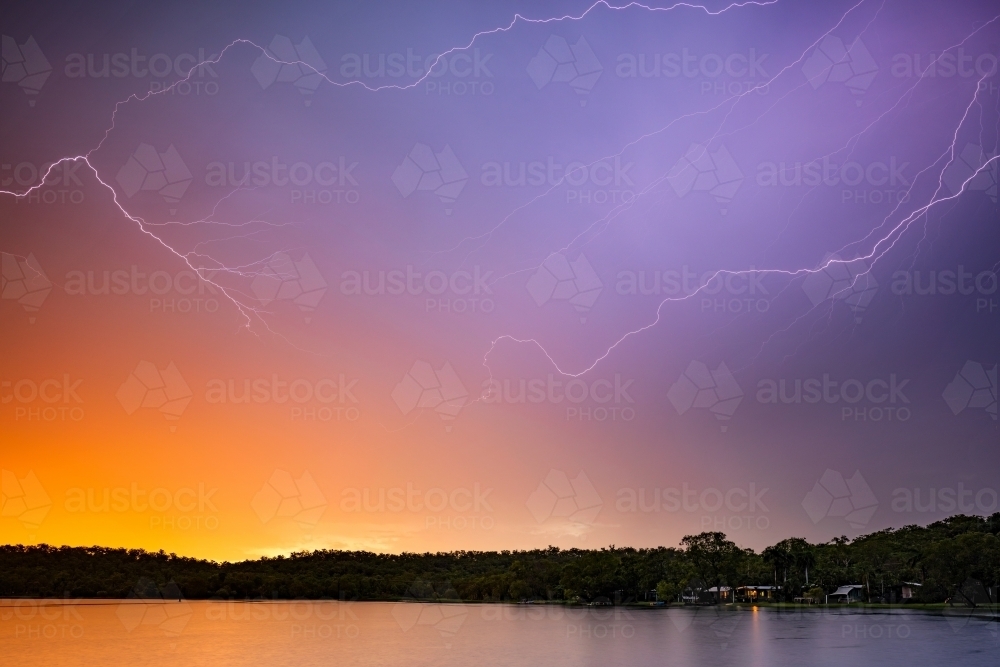 Sunset Lightning over Lake in Northern Territory - Australian Stock Image