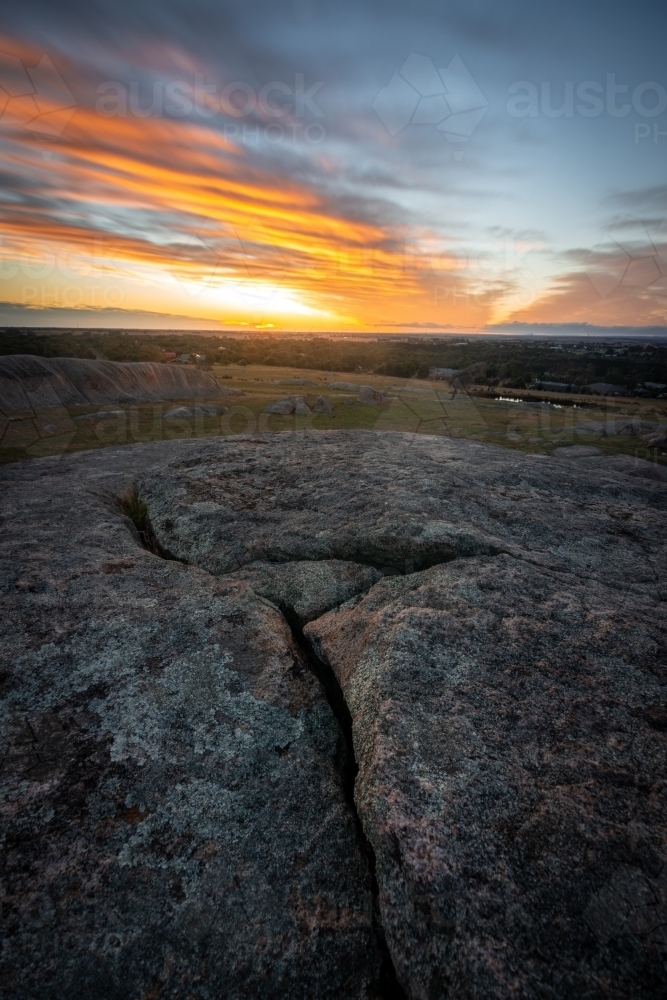 Sunset over a Rocky Rural Paddock - Australian Stock Image