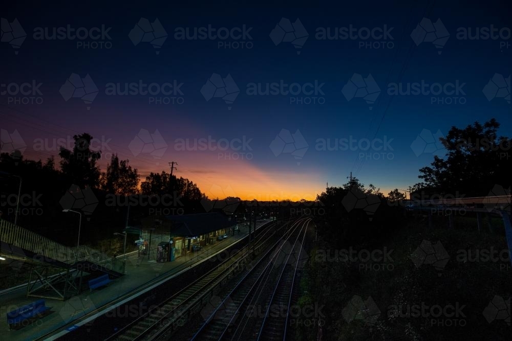Sunset over a train station - Australian Stock Image