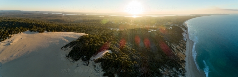 Sunset over Carlo Sand Blow at Rainbow Beach. - Australian Stock Image