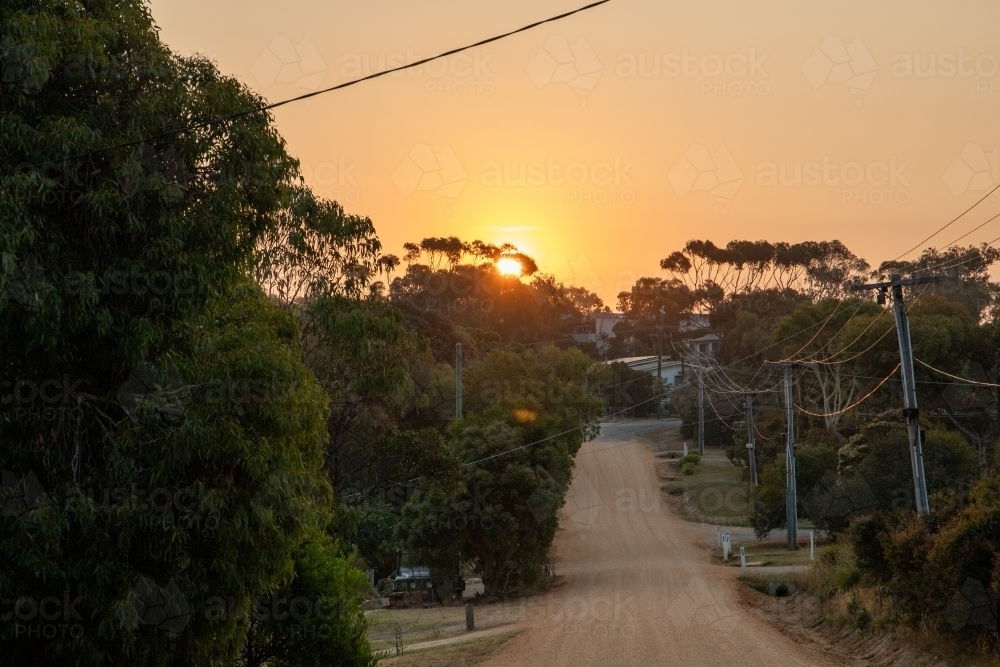 Sunset over coastal suburban road - Australian Stock Image