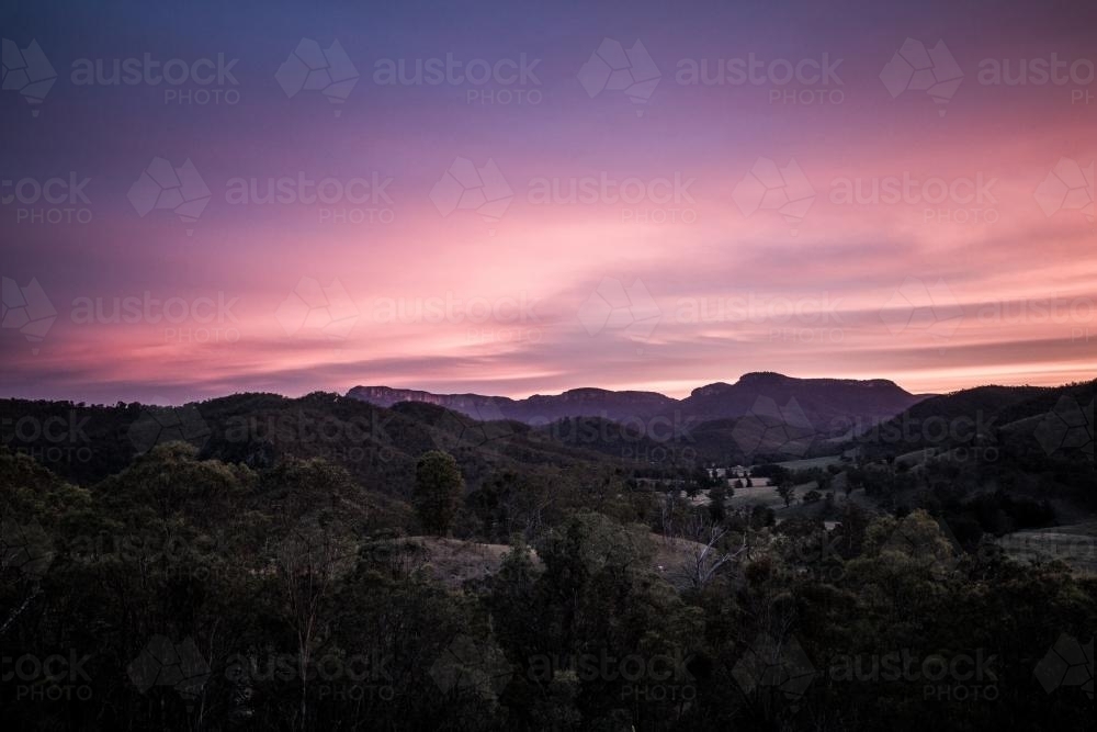 Sunset over farms in Capertee - Australian Stock Image