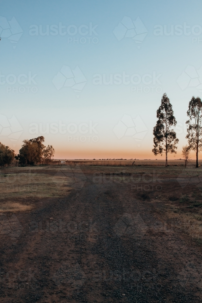 Sunset over gravel road - Australian Stock Image