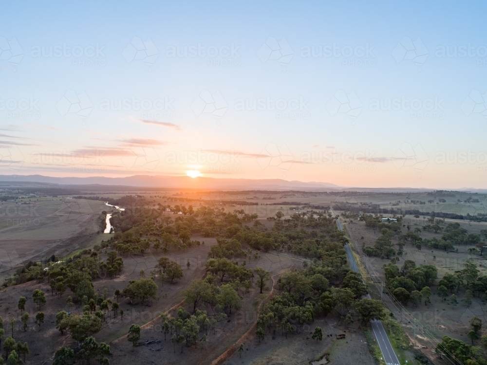 Image of Sunset over paddock beside Hunter River near Singleton ...